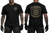 Man wearing black US Army 9th Infantry "Manchu" t-shirt, showcasing both front chest and detailed large back prints.