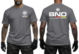 charcoal tactical t-shirt featuring the BND eagle emblem and logo on the chest. The back shows a large BND print with the full Bundesnachrichtendienst name and German flag colors.