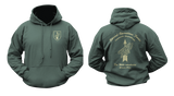 forest green Germany Special Forces KSK hoodie mockup showing a small front chest shield with an arrow and eagle graphic, and a large back print featuring the Kommando Spezialkräfte insignia and military motto.