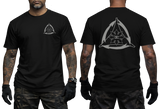 Front and back mockup of a black t-shirt featuring a gray Filipino Martial Arts logo. The design shows a tactical triangle emblem combined with a stylized Philippine sun and Baybayin script in the center.