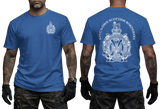 A man modeling a royal blue short-sleeve t-shirt, showing both the front and back views. The front features a small white crest on the left chest, while the back displays a large white crest with the text 'KING'S OWN SCOTTISH BORDER' arched above it.