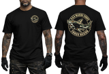 Korean Marine Corps ROKMC Force Recon tactical t-shirt featuring a front left-chest print and a large back graphic of a camouflage shark holding a rifle inside a circular military emblem on a black tee.