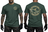 Korean Marine Corps ROKMC Force Recon tactical t-shirt featuring a front left-chest print and a large back graphic of a camouflage shark holding a rifle inside a circular military emblem on a dark green tee.