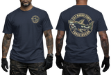 Korean Marine Corps ROKMC Force Recon tactical t-shirt featuring a front left-chest print and a large back graphic of a camouflage shark holding a rifle inside a circular military emblem on a navy tee.