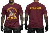 Los Perros de la Guerra Atlacatl T-Shirt in maroon featuring a snarling wolf graphic and yellow military-inspired lettering on the front and back