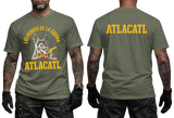 Los Perros de la Guerra Atlacatl T-Shirt in military green with a distressed wolf design on the front and bold yellow ATLACATL lettering on the back