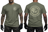 Two-view composite image of a military green t-shirt featuring Polish Navy Special Forces JW Formoza graphics. The left side shows the front of the shirt with a small circular chest emblem. The right side shows the back of the shirt with a large circular crest featuring the unit's emblem and motto text. The shirt is displayed on a male model with tattooed arms and tactical gloves.