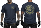 Two-view composite image of a navy t-shirt featuring Polish Navy Special Forces JW Formoza graphics. The left side shows the front of the shirt with a small circular chest emblem. The right side shows the back of the shirt with a large circular crest featuring the unit's emblem and motto text. The shirt is displayed on a male model with tattooed arms and tactical gloves.