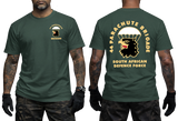 Front and back views of a man wearing a forest green SADF 44 Parachute Brigade T-Shirt. Features a parachute and eagle head emblem on the left chest and a large back graphic displaying "44 Parachute Brigade South African Defence Force" with the airborne crest.