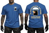 Front and back views of a man wearing a blue SADF 44 Parachute Brigade T-Shirt. Features a parachute and eagle head emblem on the left chest and a large back graphic displaying "44 Parachute Brigade South African Defence Force" with the airborne crest.