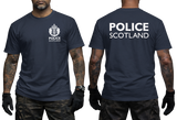 A man modeling a navy blue short-sleeve t-shirt, showing both the front and back views. The front features a white Police Scotland crest on the left chest, and the back features 'POLICE SCOTLAND' printed in large white capital letters across the upper back.