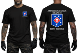 Front and back view of a black t-shirt featuring the US Marine Corps Amphibious Raids Branch HRST Master logo. The front features a small unit shield insignia with a skull and stars on the left chest. The back displays a large version of the same insignia with 'AMPHIBIOUS RAIDS BRANCH' above it and 'HRST MASTER' below.