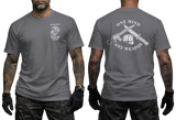 USMC MCMAP Instructor Trainer T-Shirt in charcoal gray with a Marine Corps Martial Arts chest emblem and One Mind Any Weapon graphic on the back