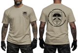 A man modeling a tan short-sleeve T-shirt shown from the front and back. The front has a small black crest logo on the left chest, and the back has a large black Special Operations Forces Austria Jagdkommando graphic with parachutists and text.