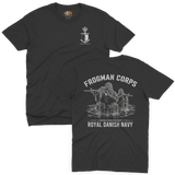 Two-view composite image of a black t-shirt featuring Royal Danish Navy Frogman Corps (Frømandskorpset) graphics. The top view shows the front of the shirt with a small anchor, shield, and crown chest emblem and 'Frømandskorpset' text. The bottom view shows the back of the shirt with a large graphic of frogman commandos wading through water with rifles, 'Frogman Corps' heading, and 'Royal Danish Navy' text at the bottom.
