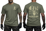 Man wearing military green Executive Outcomes PMC Africa Operations t-shirt, showcasing both front chest knight logo and large back tactical map print.