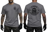 A man modeling a gray short-sleeve T-shirt shown from the front and back. The front has a small black crest-style logo on the left chest, and the back has a large black circular graphic with the words 'PLONGEUR D'INTERVENTION' and a central emblem.