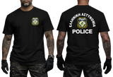 Front and back views of a black short-sleeve t-shirt worn by a model. The front features a small Greek police badge graphic on the left chest.