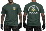 Front and back views of a dark green short-sleeve t-shirt worn by a model. The front features a small crest on the left chest, and the back features a large crest with the text 'ΕΛΛΗΝΙΚΗ ΑΣΤΥΝΟΜΙΑ POLICE' in white.
