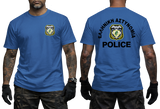Front and back views of a blue short-sleeve t-shirt worn by a model. The front features a small crest on the left chest, while the back displays a large crest with the text 'ΕΛΛΗΝΙΚΗ ΑΣΤΥΝΟΜΙΑ POLICE' in black.