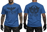 Two-view composite image of a royal blue t-shirt featuring Roman-inspired SPQR graphics. The left side shows the front of the shirt with a small emblem. The right side shows the back of the shirt with a large imperial eagle graphic and 'SPQR' text. The shirt is displayed on a male model with tattooed arms and tactical gloves.