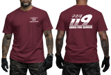 Front and back view of a tattooed male model wearing a tactical maroon t-shirt. The left chest features a small white winged "KOREA FIRE SERVICE" emblem. The back showcases a large white "119" graphic with Korean Hangeul text "구조대" above it and "KOREA FIRE SERVICE" printed below.