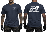 Front and back view of a tattooed male model wearing a tactical Navy Blue t-shirt. The left chest features a small white winged "KOREA FIRE SERVICE" emblem. The back showcases a large white "119" graphic with Korean Hangeul text "구조대" above it and "KOREA FIRE SERVICE" printed below.