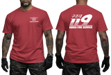 Front and back view of a tattooed male model wearing a tactical Red t-shirt. The left chest features a small white winged "KOREA FIRE SERVICE" emblem. The back showcases a large white "119" graphic with Korean Hangeul text "구조대" above it and "KOREA FIRE SERVICE" printed below.