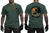 Front and back views of a man wearing an olive green t-shirt. The front features a small circular Scout Ranger logo on the left chest, and the back features a large circular graphic with a black wolf, an orange diagonal stripe, and the text 'SCOUT RANGER WE STRIKE'.