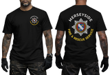 A black short-sleeve t-shirt shown on a model from both the front and back. The front features a small circular chest logo for 'Herskyside Fire & Rescue Squad'.